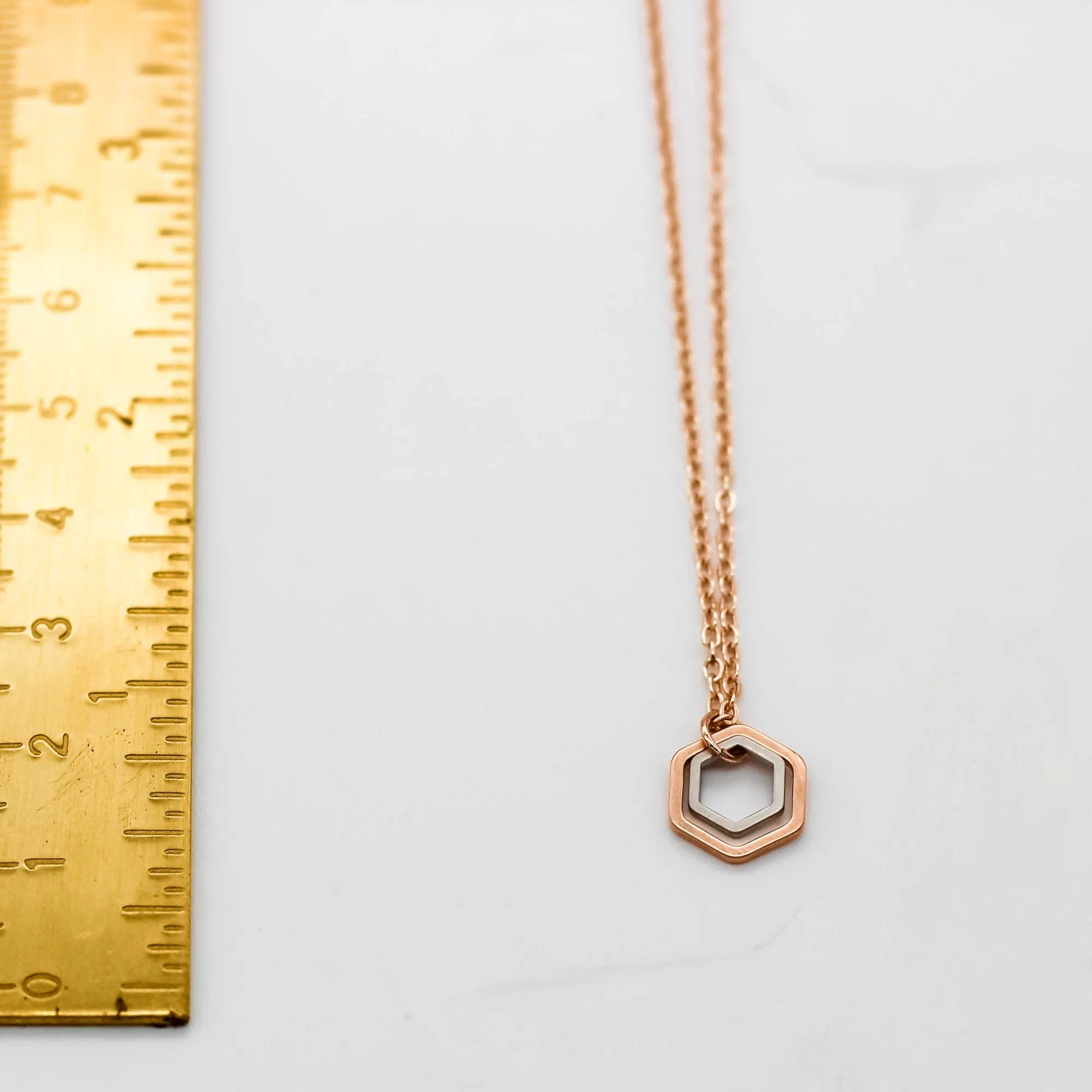 "Le Contour" Mini Hexagon Black & Gold Mixed Metal Necklace