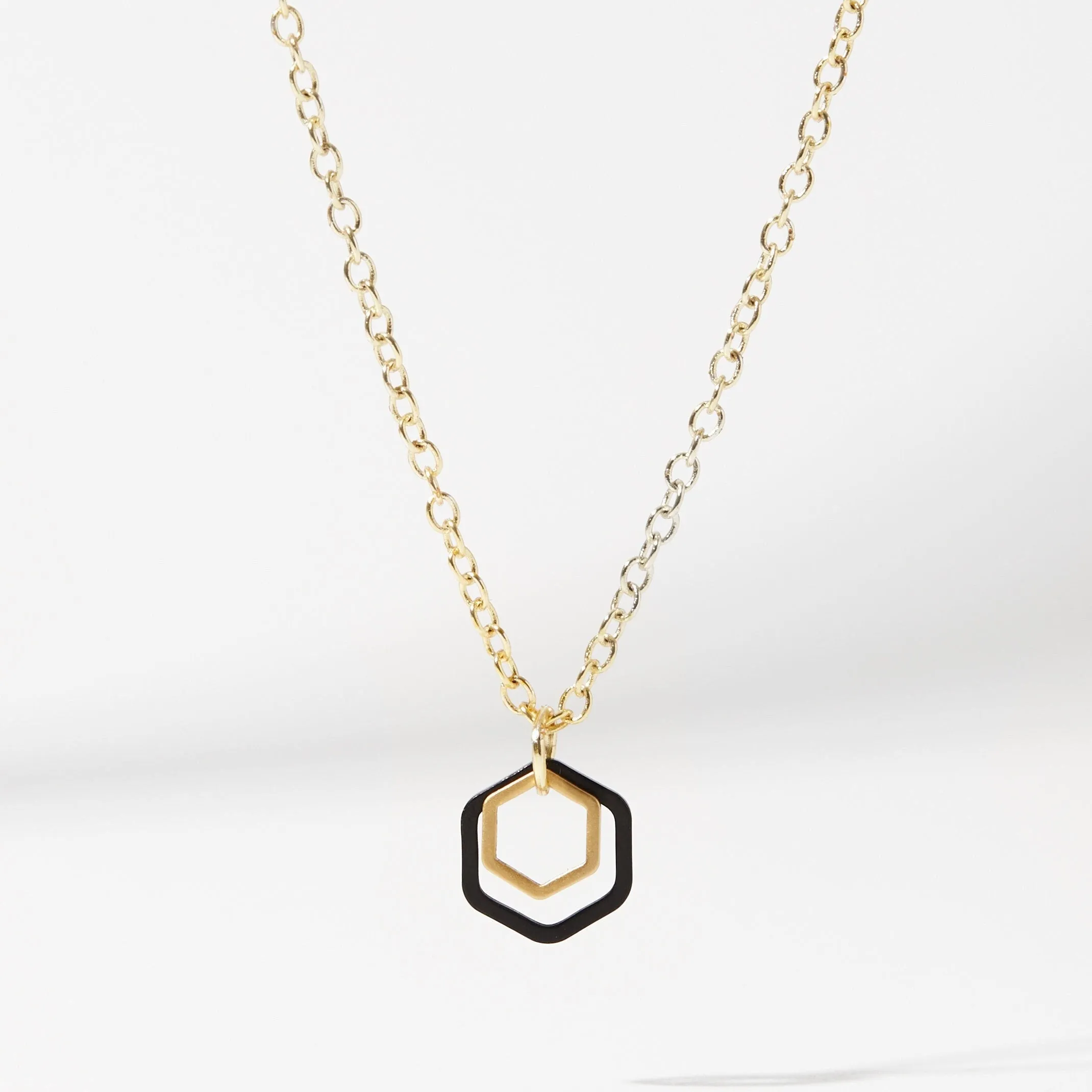 "Le Contour" Mini Hexagon Black & Gold Mixed Metal Necklace